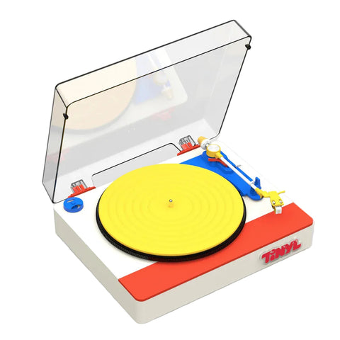 Model turntable with a yellow platter and red base on a white background