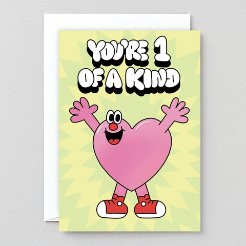 Card with a cartoon character and text 'You're 1 of a Kind' on a yellow background