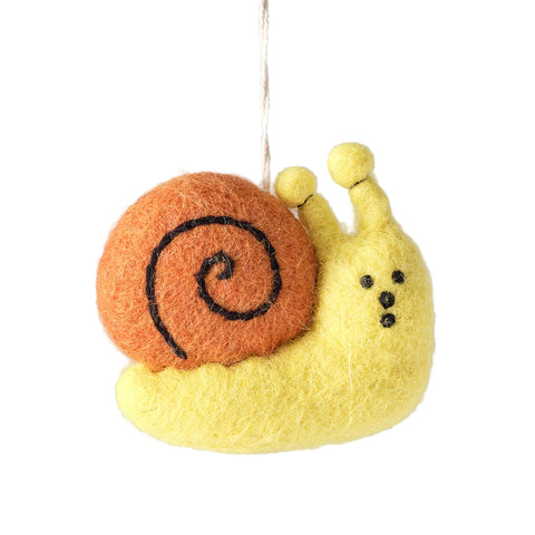 Felt snail ornament on a gray background