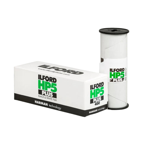 A box of Ilford HP5 400 black and white film next to its corresponding film roll.