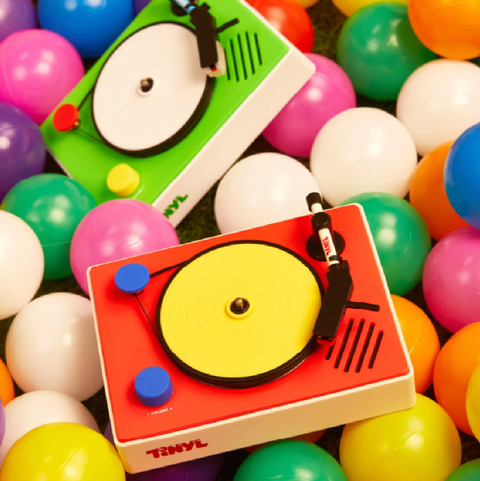 Toy record player with a turntable on colorful balls
