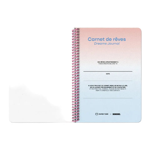 Dreams Journal with pink and blue gradient cover on a white background